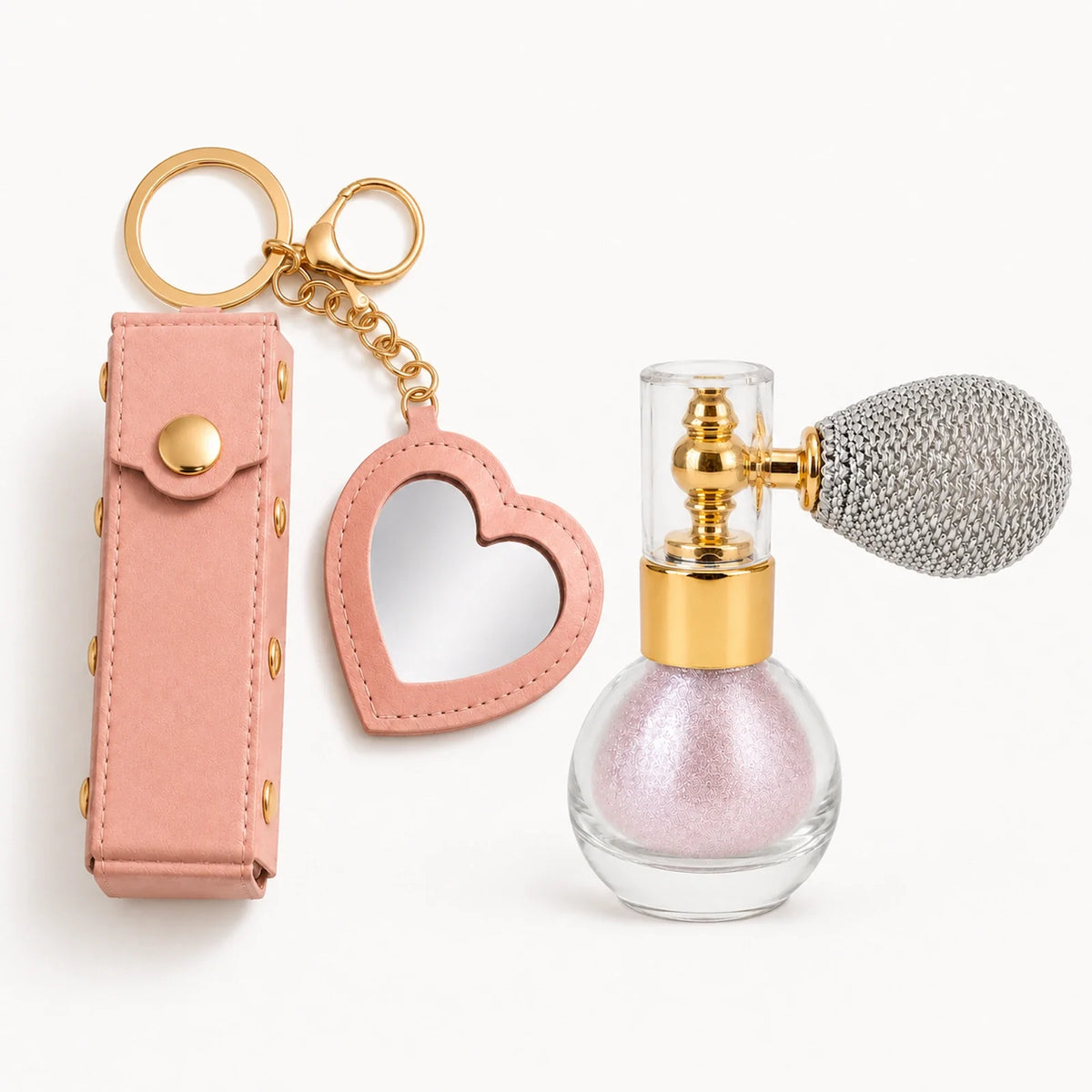 Birthday Glow Gift Set clean product contents with soft pink shimmer atomizer and heart mirror lipstick holder keychain