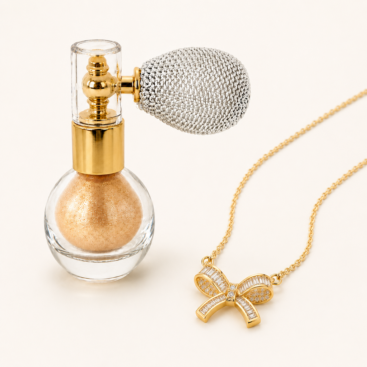 Champagne Date Night Glow Bundle clean product contents with champagne shimmer atomizer and gold bow necklace