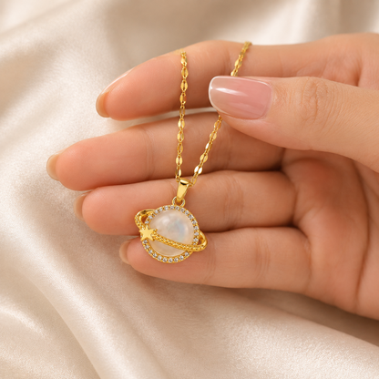 Gold Celestial Planet Pendant Necklace handheld scale reference