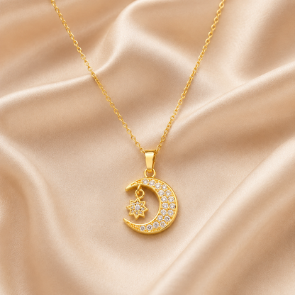 Gold Moon & Star Pendant Necklace on champagne satin