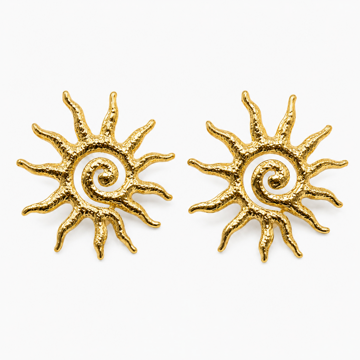 Gold Sun Statement Earrings isolated on a clean white background