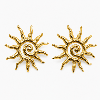 Gold Sun Statement Earrings isolated on a clean white background
