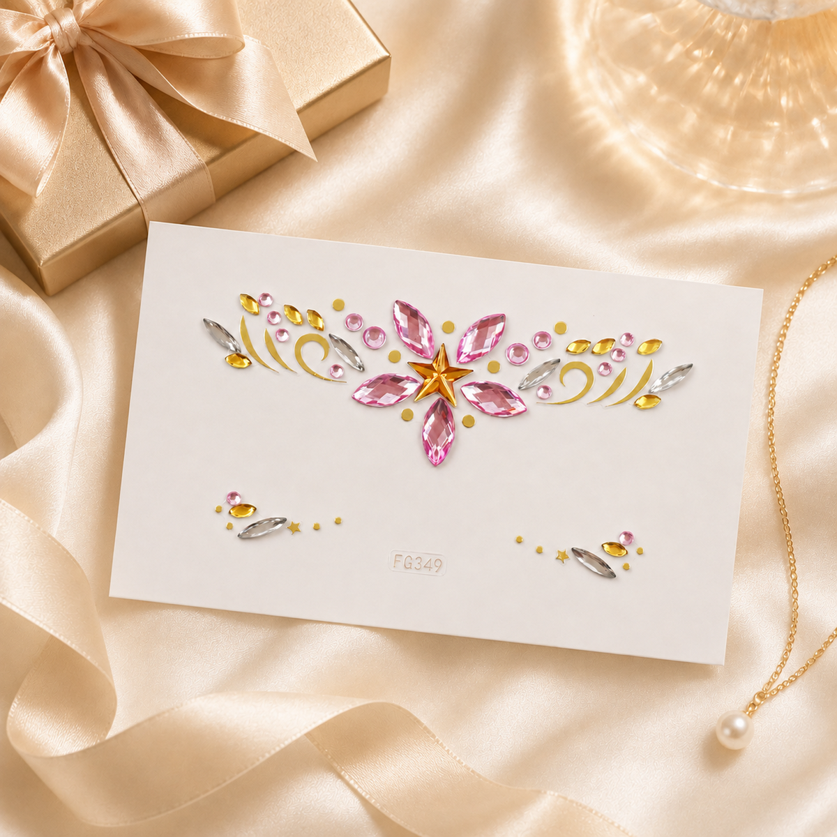 Pink Star Festival Face Gems gift-ready presentation on champagne satin