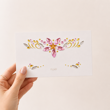 Pink Star Festival Face Gems card held in hand to show size and scale