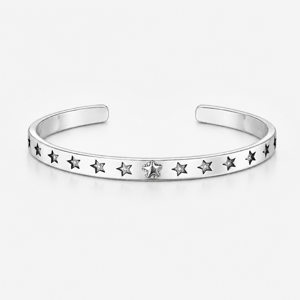 Polished Silver Star Cuff Bracelet on white background