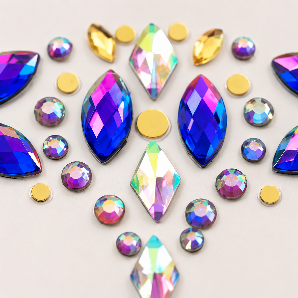 Close-up detail of Rainbow Jewel Festival Face Gems showing faceted blue purple and iridescent rhinestones