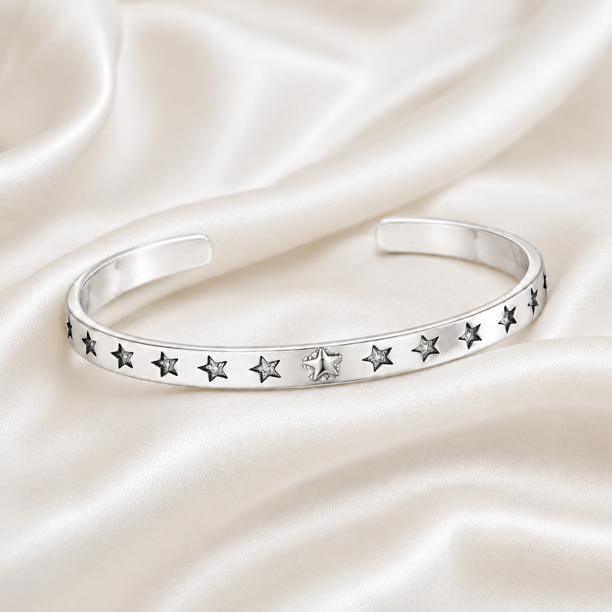 Silver Star Cuff Bracelet styled on ivory silk