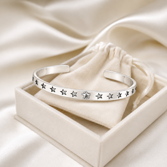 Silver Star Cuff Bracelet displayed in ivory velvet gift box