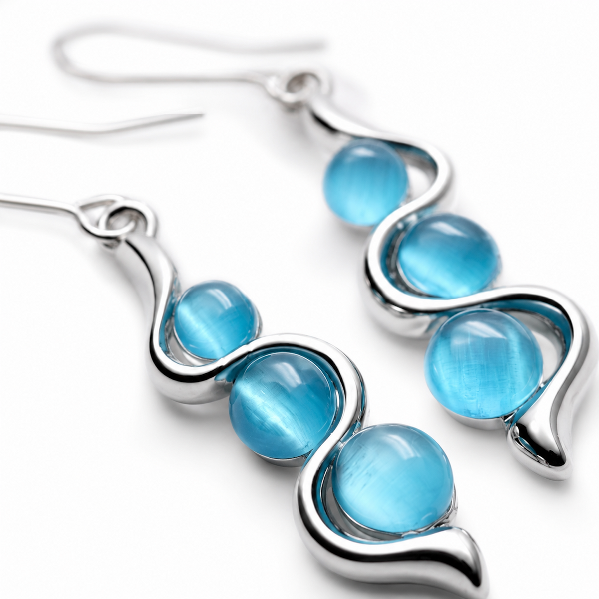 Blue Wave Dangle Earrings clean product view on a light neutral surface