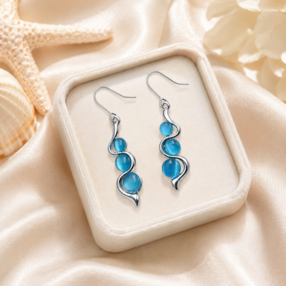Blue Wave Dangle Earrings styling inspiration image