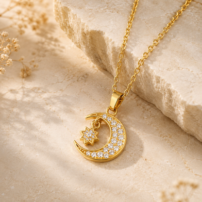 Gold Moon and Star Pendant Necklace shown with scale reference