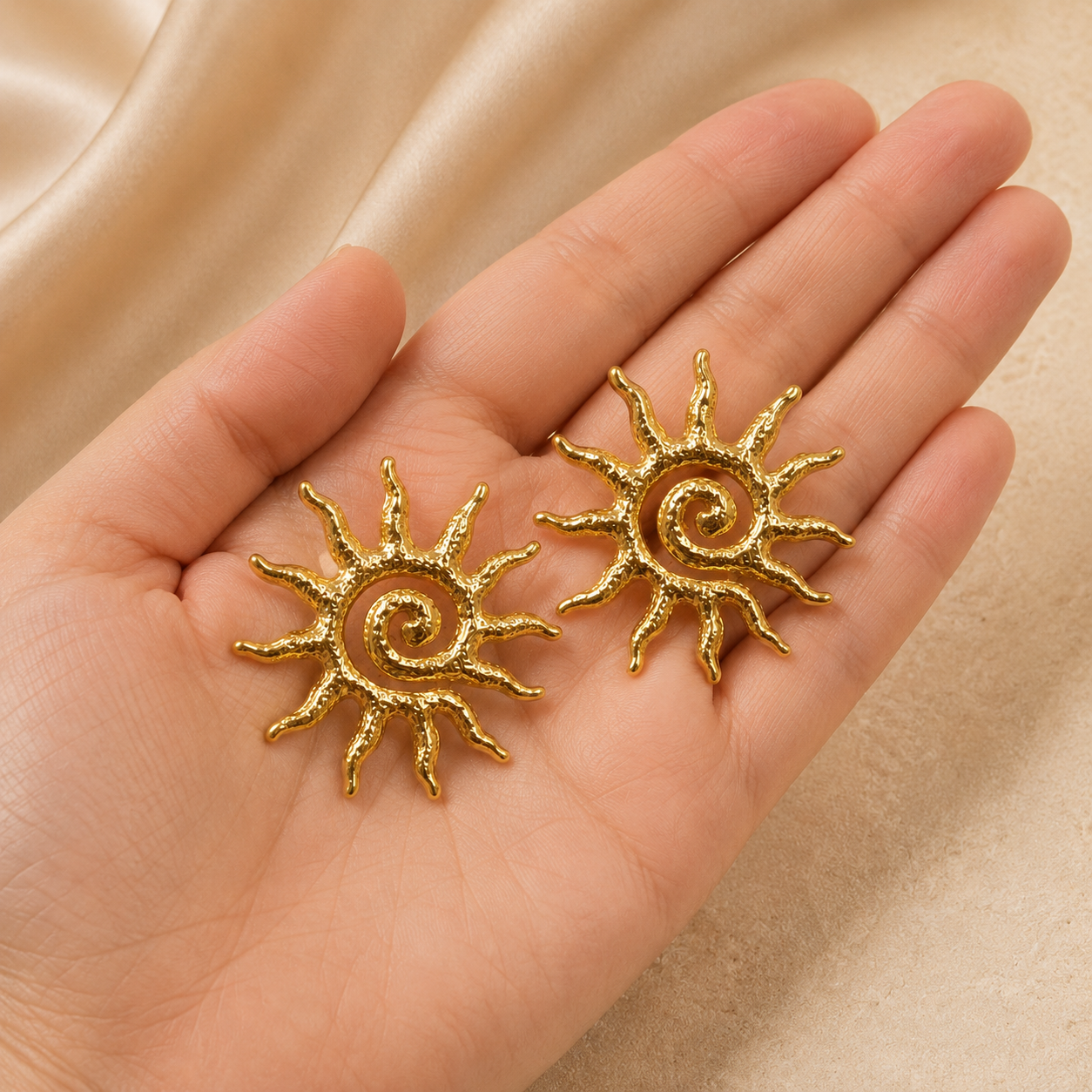 Golden Sun Earrings shown with scale reference