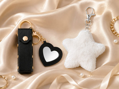 Luxe Little Extras Gift Set with black mini heart mirror keychain and white star pom pom keychain variant