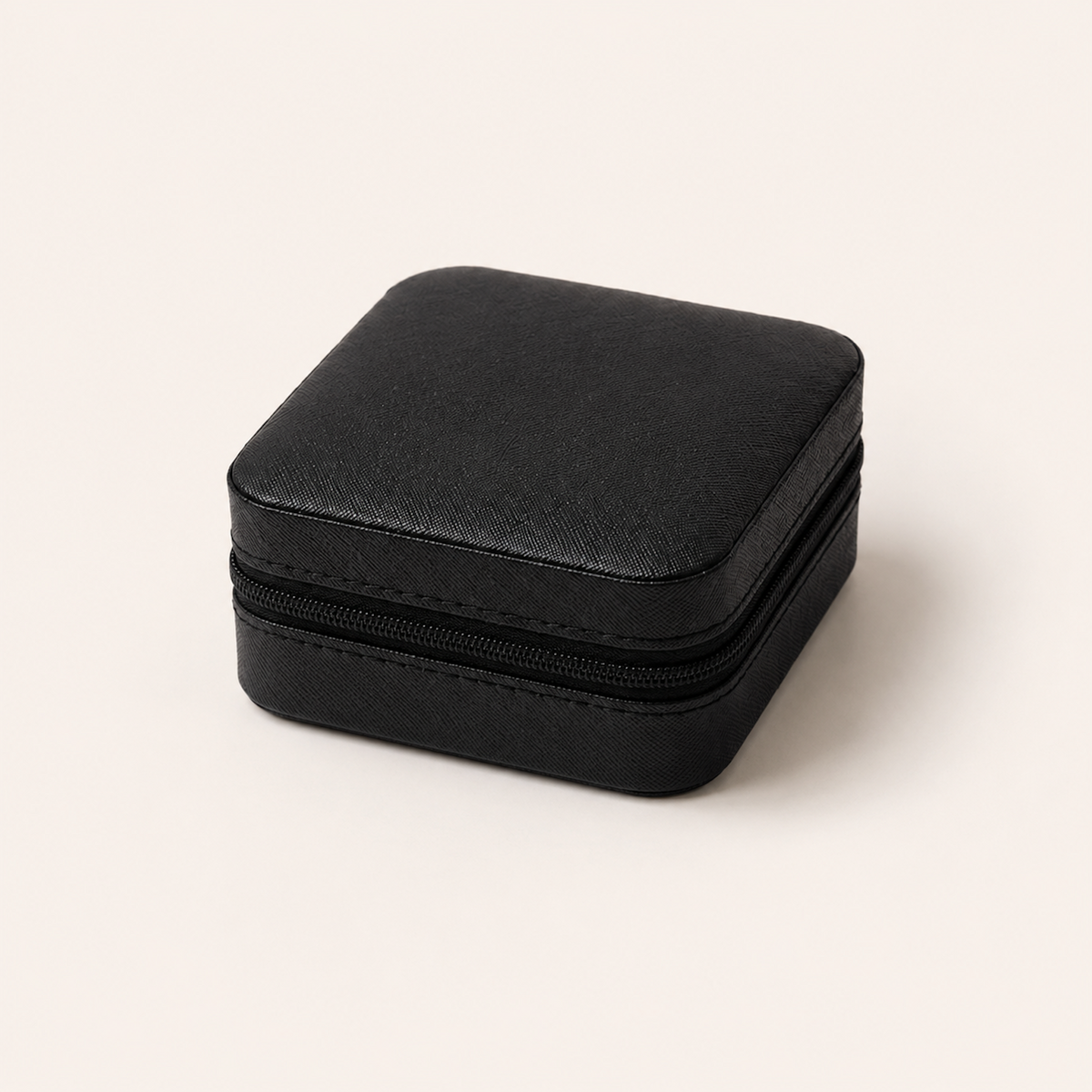 Black Mini Travel Jewelry Box closed with textured exterior and zipper