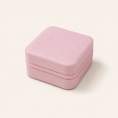 Pink Mini Travel Jewelry Box closed with textured exterior and zipper