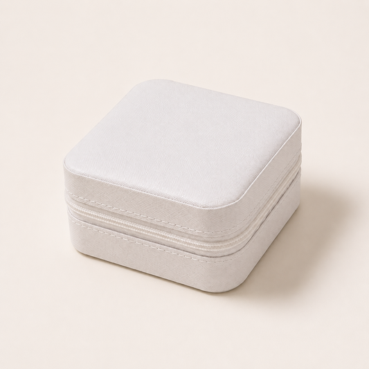 White Mini Travel Jewelry Box closed with textured exterior and zipper