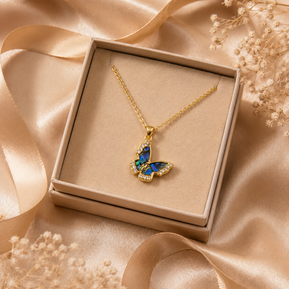 Natural Shell Butterfly Pendant Necklace presented in a gift box on champagne satin