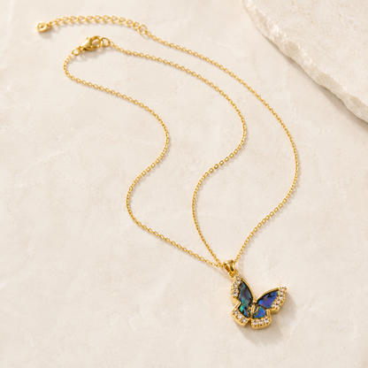 Natural Shell Butterfly Pendant Necklace with iridescent blue shell and crystal accents
