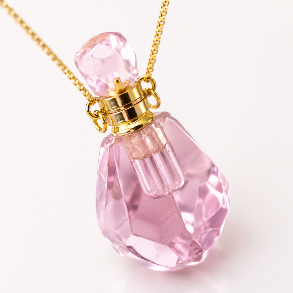 Close-up detail of Pink Crystal Perfume Bottle Necklace