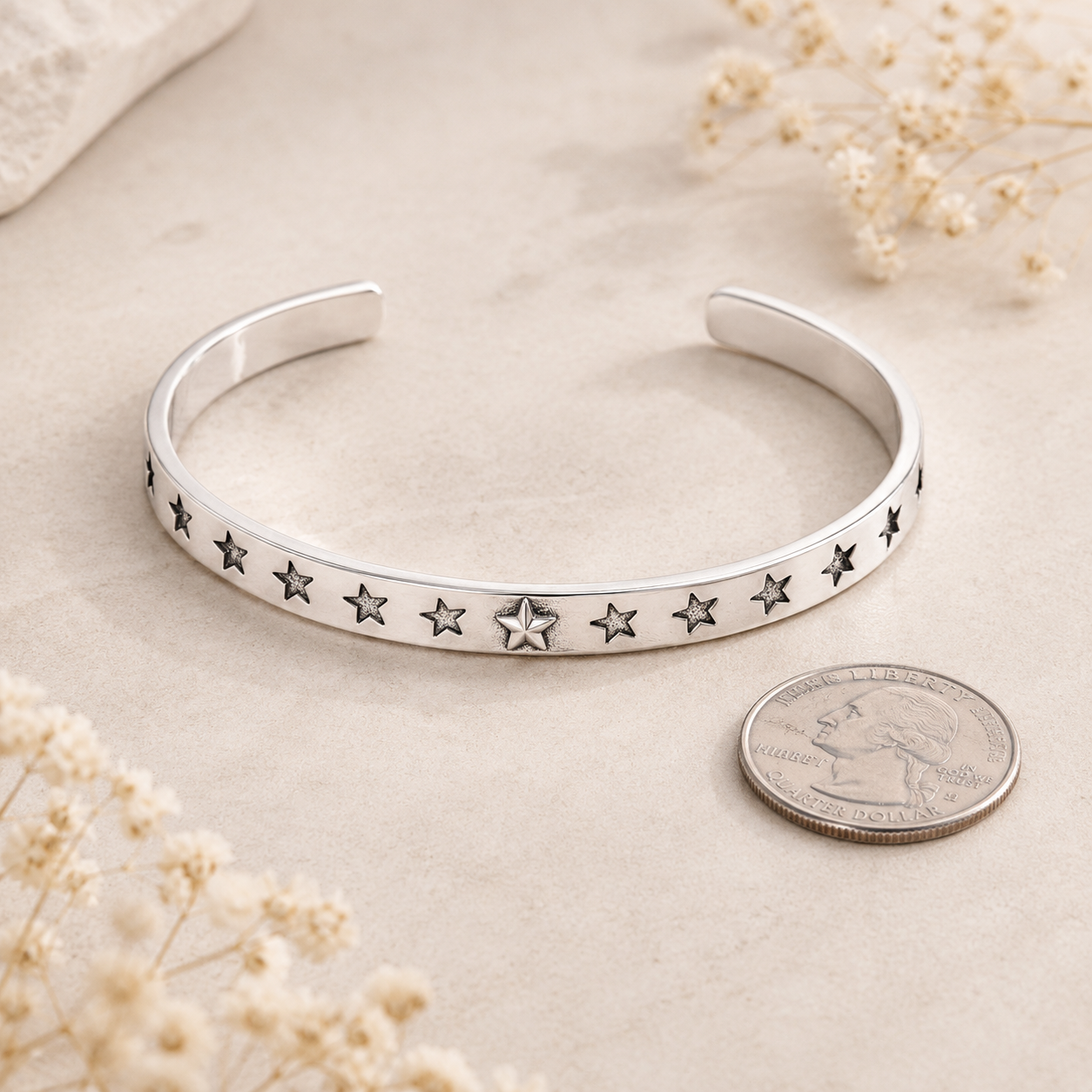 Silver Star Cuff Bracelet shown with scale reference