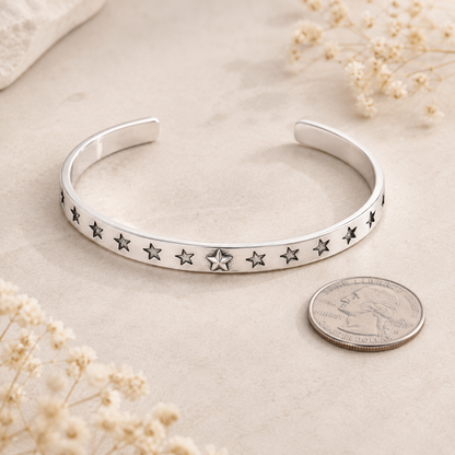 Silver Star Cuff Bracelet shown with scale reference