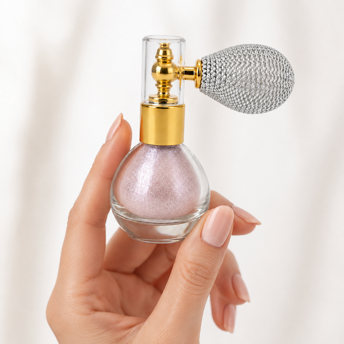 Soft Pink Body & Hair Shimmer Powder shown handheld