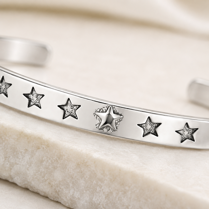 Close-up of embossed star details on Silver Star Cuff Bracelet